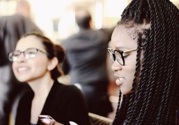 women-smiling-on-tech.jpg