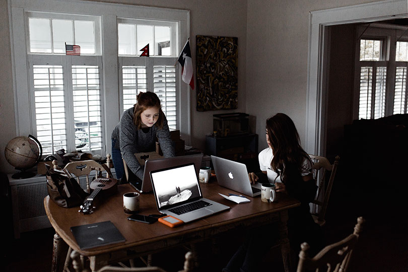 Two teens creating advertising for an American Eagle campaign