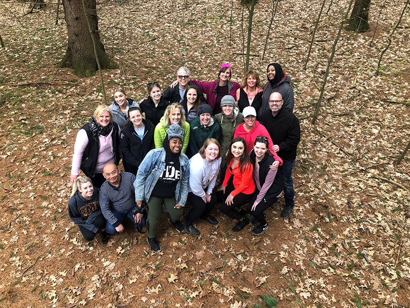 Brogan group photo at Camp Tamarack during team building experience