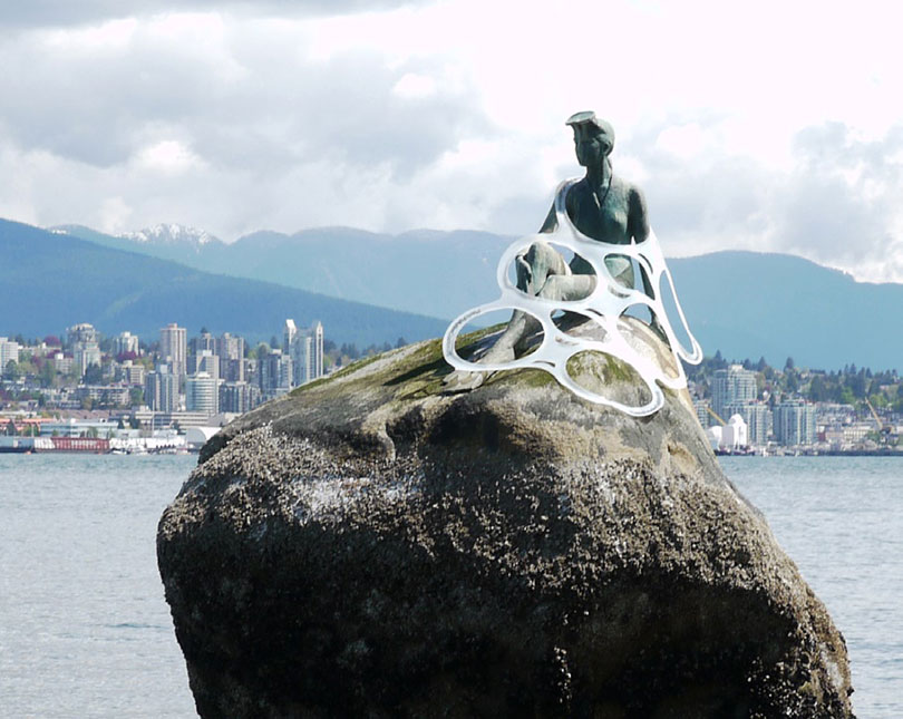 Plastic six-pack rings caught on mermaid statue