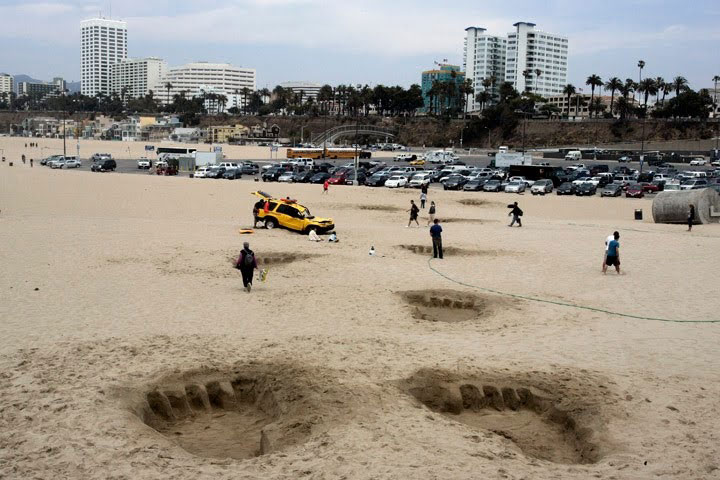 Giant footprints in sand