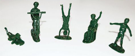 Toy soldier figurines enjoying childhood activities